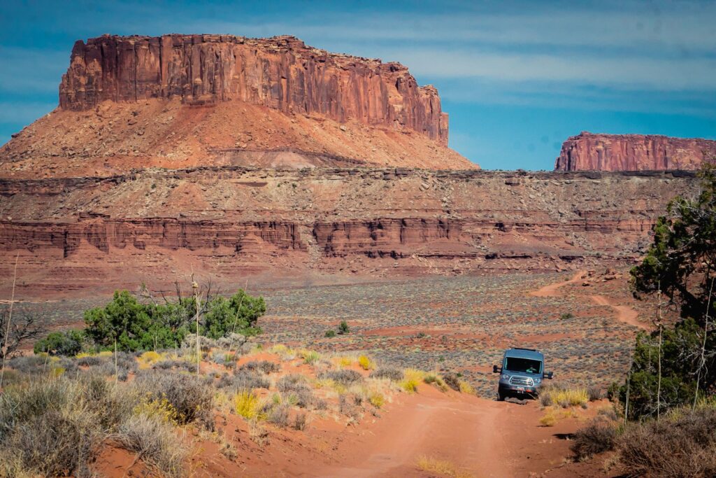jeep tour in the stunning Utah desert through majestic buttes and rugged terrain.